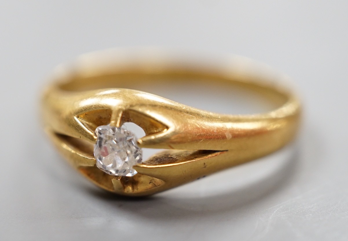 A late Victorian 18ct gold an claw set solitaire diamond ring, size Q, gross weight 5.2 grams.